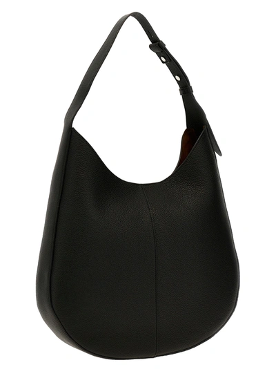 Shop Tod's Sacca Oboe Shoulder Bags Black