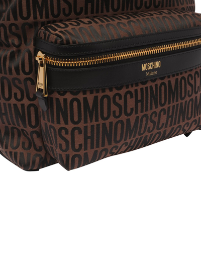 Shop Moschino All Over Logo Backpack In Brown
