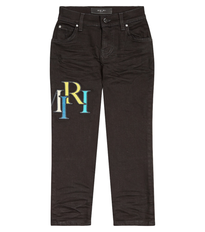 Shop Amiri Distressed Logo Skinny Jeans In Black