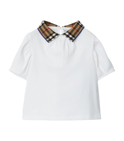 Shop Burberry Kids Check Print Polo Shirt (6-24 Months) In White