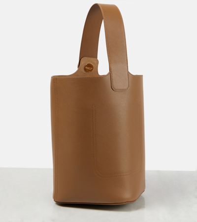 Shop Loewe Pebble Medium Leather Bucket Bag In Brown