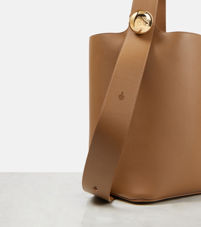 Shop Loewe Pebble Medium Leather Bucket Bag In Brown