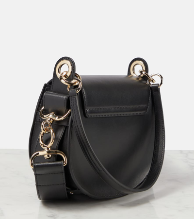 Shop Chloé Tess Small Suede Shoulder Bag In Black