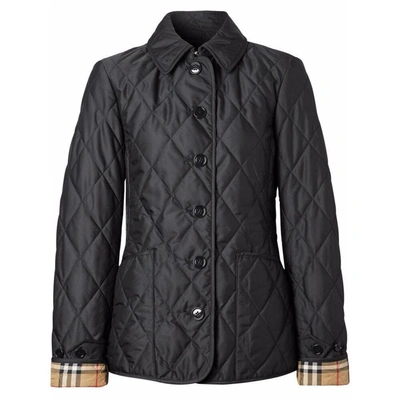 Shop Burberry Outerwears In Black