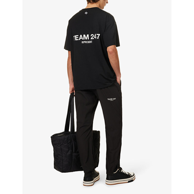 Shop 247 By Represent Men's Black Brand-print Tapered-leg Stretch-woven Jogging Bottoms