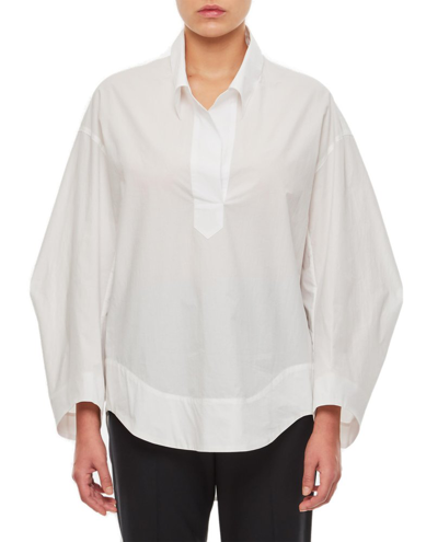 Shop Khaite The Melan Drop Shoulder Blouse In White