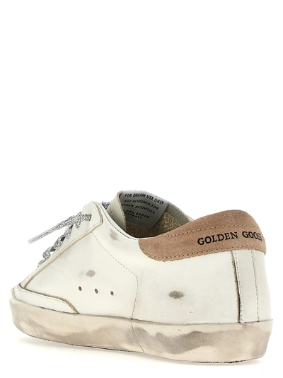 Shop Golden Goose Superstar Sneakers Pink