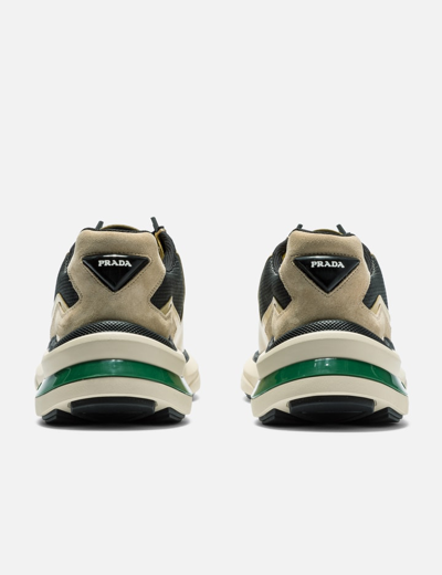 Shop Prada System Brushed Leather Sneakers In Yellow