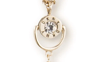 Shop Dkny Tassel Pendant Long Necklace In Gold