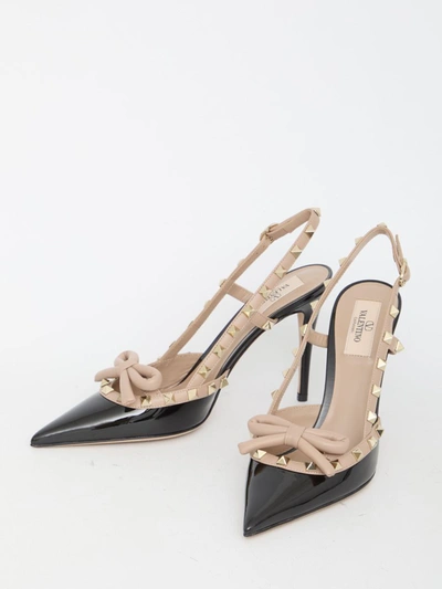 Shop Valentino Rockstud Bow Slingback Pumps In Black