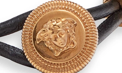 Shop Versace Coin Pendant Bracelet In Black  Gold