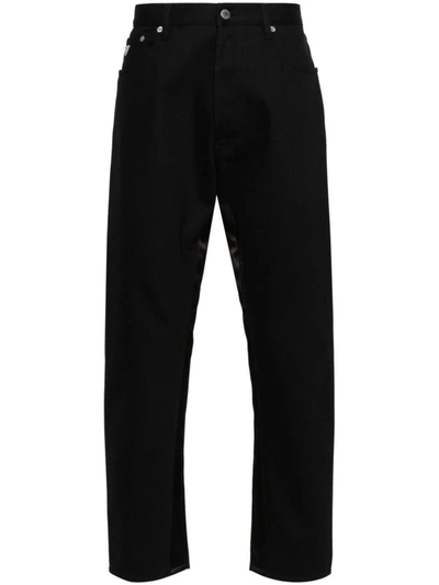Shop Prada Enamel-logo Mid-rise Jeans In Black