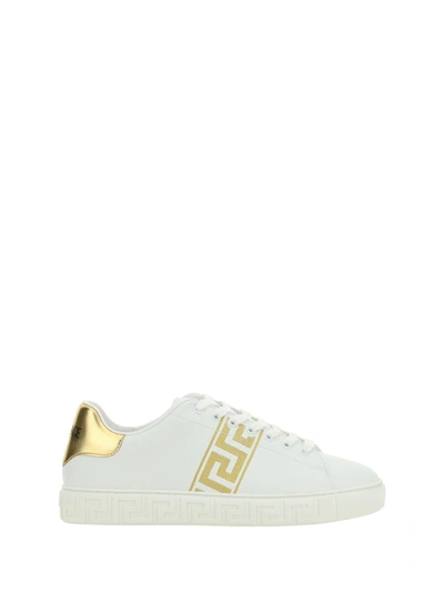 Shop Versace Sneakers In White/gold