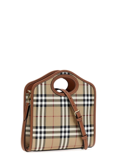 Shop Burberry 'pocket' Mini Handbag In Brown