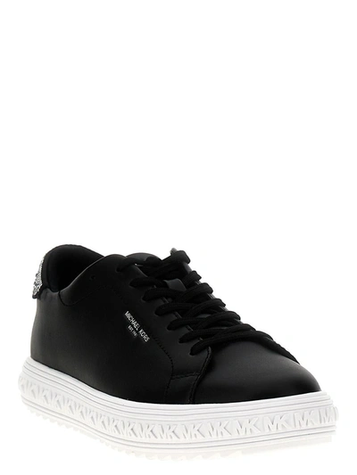 Shop Michael Kors 'grive' Sneakers In White/black