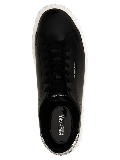 Shop Michael Kors 'grive' Sneakers In White/black