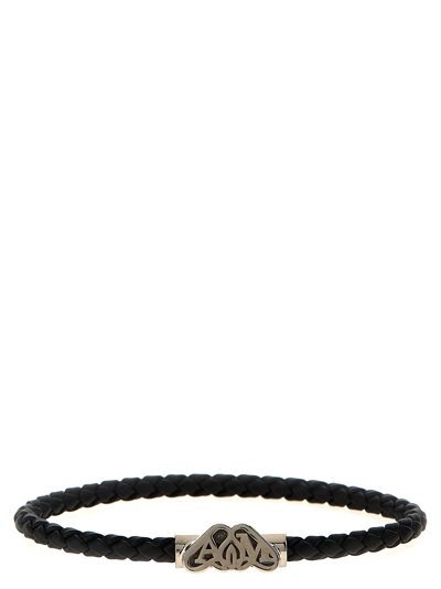 Shop Alexander Mcqueen Logo Seal Bracelet In Black