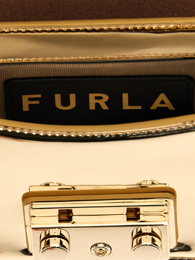 Shop Furla Metropolis Mini Crossbody Bag In Gold