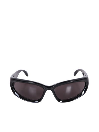 Shop Balenciaga Swift Oval Black Sunglasses