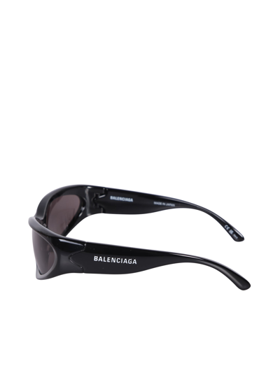Shop Balenciaga Swift Oval Black Sunglasses