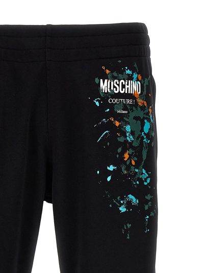 Shop Moschino Logo Print Joggers In Black
