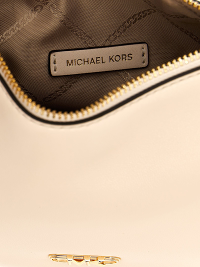 Shop Michael Kors Small Bracelet Pouchette Handbag In White