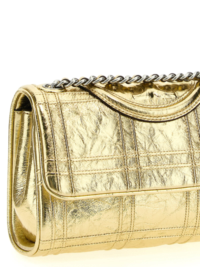 Shop Tory Burch Fleming Small Convertible Crossbody Bag In Gold