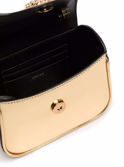 Shop Versace Mini Gold Handbag With Medusa Head Detail In Metallic Leather Woman