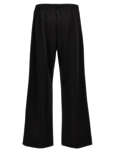 Shop Jw Anderson J.w. Anderson 'bootcut Track' Pants In Black