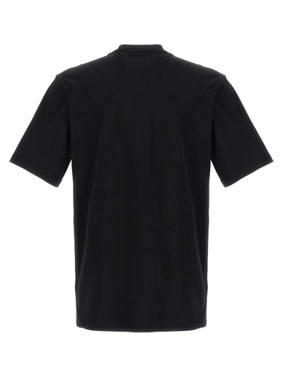 Shop Moschino Logo T-shirt In White/black