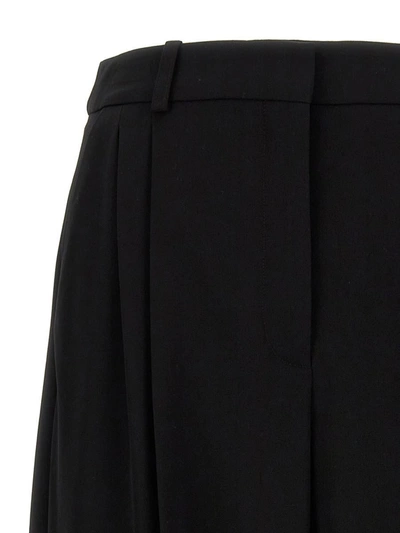 Shop Stella Mccartney Pants With Front Pleats In Black