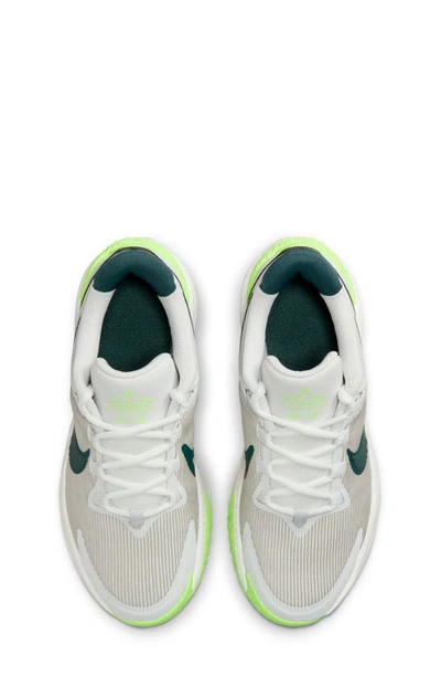 Shop Nike Kids' Star Runner 4 Sneaker In Photon Dust/ Jungle/ White