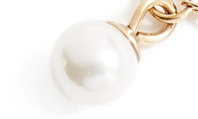 Shop Knotty Imitation Pearl Charm Bracelet In Gold