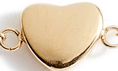 Shop Knotty Delicate Heart Bracelet In Gold