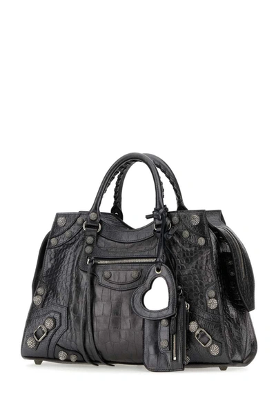 Shop Balenciaga Handbags. In Grey