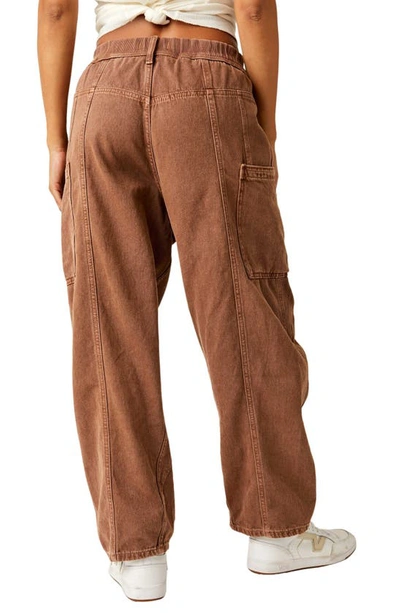Shop Free People New School Relaxed Straight Leg Cargo Jeans In Warm Brown
