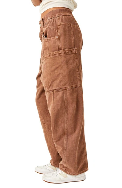 Shop Free People New School Relaxed Straight Leg Cargo Jeans In Warm Brown