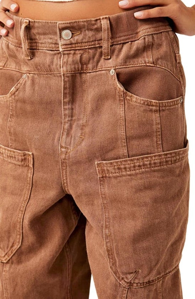 Shop Free People New School Relaxed Straight Leg Cargo Jeans In Warm Brown