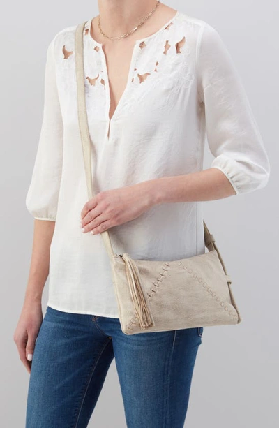 Shop Hobo Paulette Small Leather Crossbody Bag In Gold