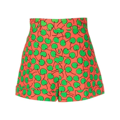 Shop Moschino Pants In Orange/green