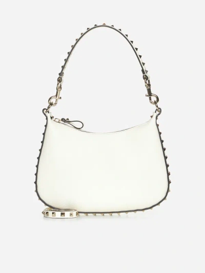 Shop Valentino Rockstud Leather Small Hobo Bag In Ivory