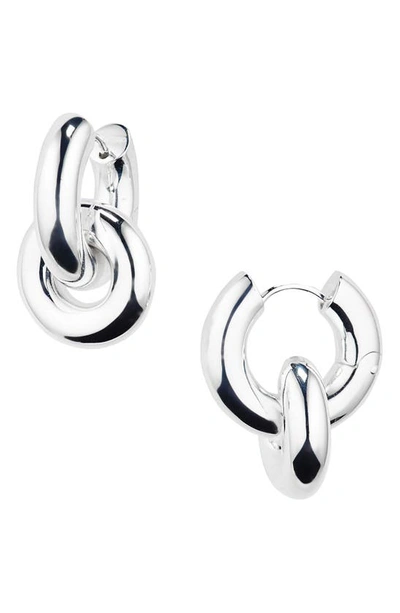 Shop Lie Studio The Esther Huggie Hoop Earrings In Silver Plating