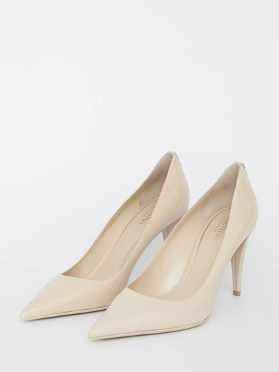 Shop Valentino Rockstud Pumps In Beige