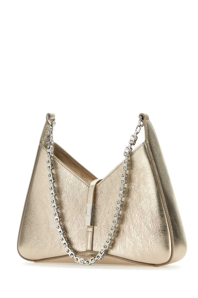 Shop Givenchy Handbags. In Gold
