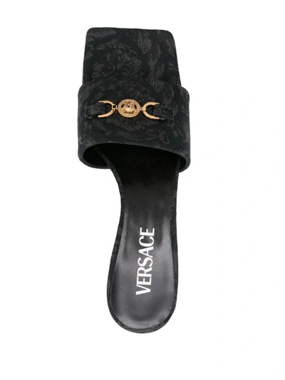 Shop Versace Sandals In Black