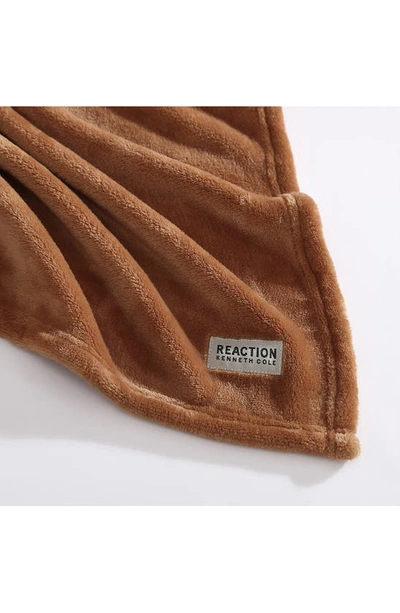 Shop Kenneth Cole Solid Throw Blanket In Ginger Orange