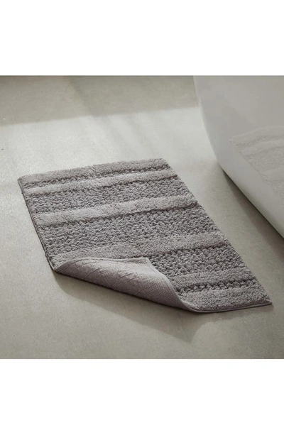 Shop Kenneth Cole Set Of 2 Waffle Bath Mats In Pebble Grey