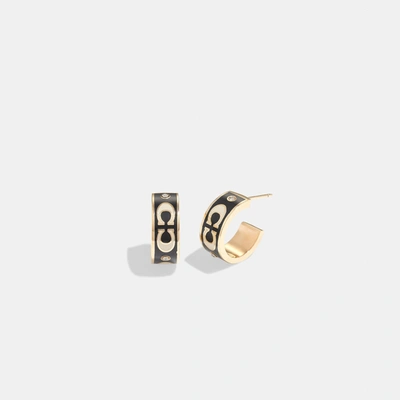 Shop Coach Outlet Signature Enamel Huggie Earrings In Silver