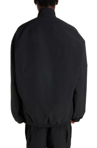 Balenciaga Gender Inclusive Oversize Cocoon Kick Technical Ripstop Windbreaker In Black