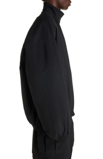 Balenciaga Gender Inclusive Oversize Cocoon Kick Technical Ripstop Windbreaker In Black